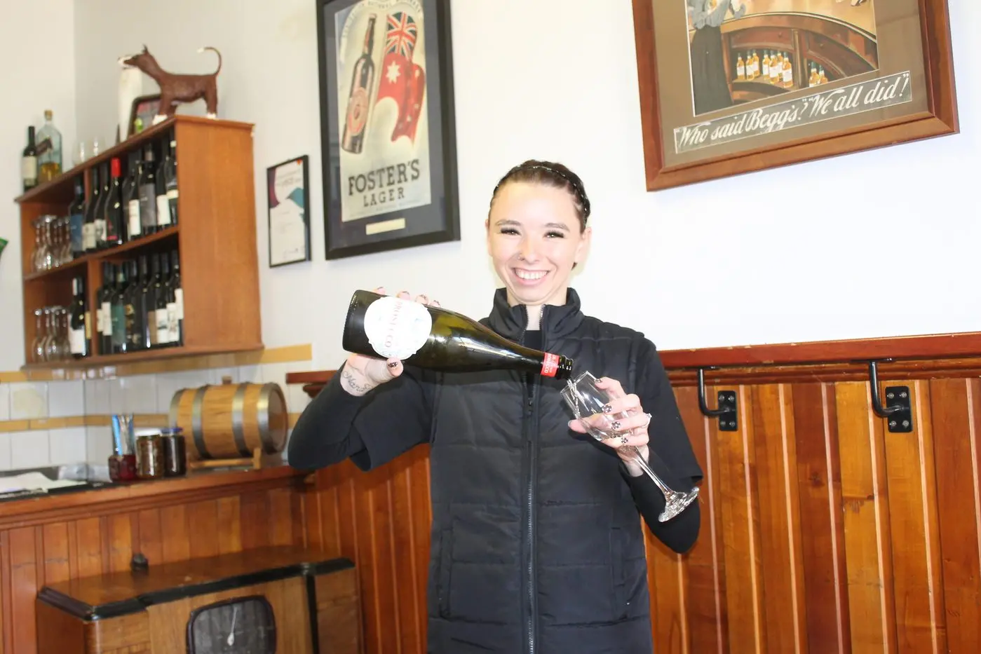 ENJOY A SIP: Plough Inn bartender and waitress Shakira Bell is expecting to pour lighter whites and spritzers as the weather warms up for spring. PHOTOS: Jordan Duursma