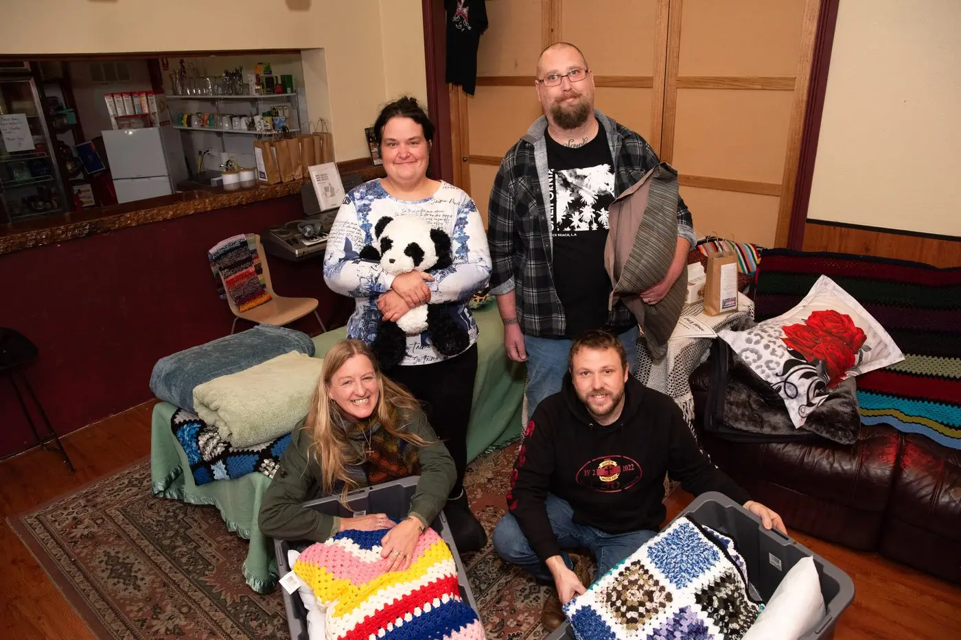 A WARM WELCOME: Gloria Henderson, volunteer Darren Pay, project manger Di Duursma and volunteer Nick Hoiles are among those offering a warm welcome to those who need a safe place to sleep and a warm meal. PHOTO: Kurt Hickling 