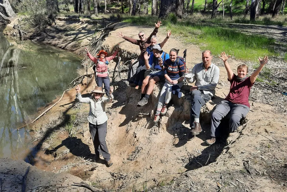 DOWN BY THE RIVERSIDE: While most of us were glued to the football on the weekend, members and friends of Warby Range Bushwalking Club made the most of the spectacular weather by taking an epic 53 kilometre walk along the Warby Range from Glenrowan to Peechelba. Cooling off by the Ovens River at Peechelba on Sunday were Jeanette Farquhar, Sandi Smith, Michael Braendler, Mary Adams, John Witmar, Shannon Walker, Stefan Bartl and Brigitte de Beer. PHOTO: Andy Kimber