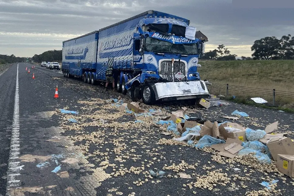 HEAVY DAMAGE: The Hume Freeway was closed near Glenrowan on Thursday morning following a three-truck collision. PHOTO: Environment Protection Authority