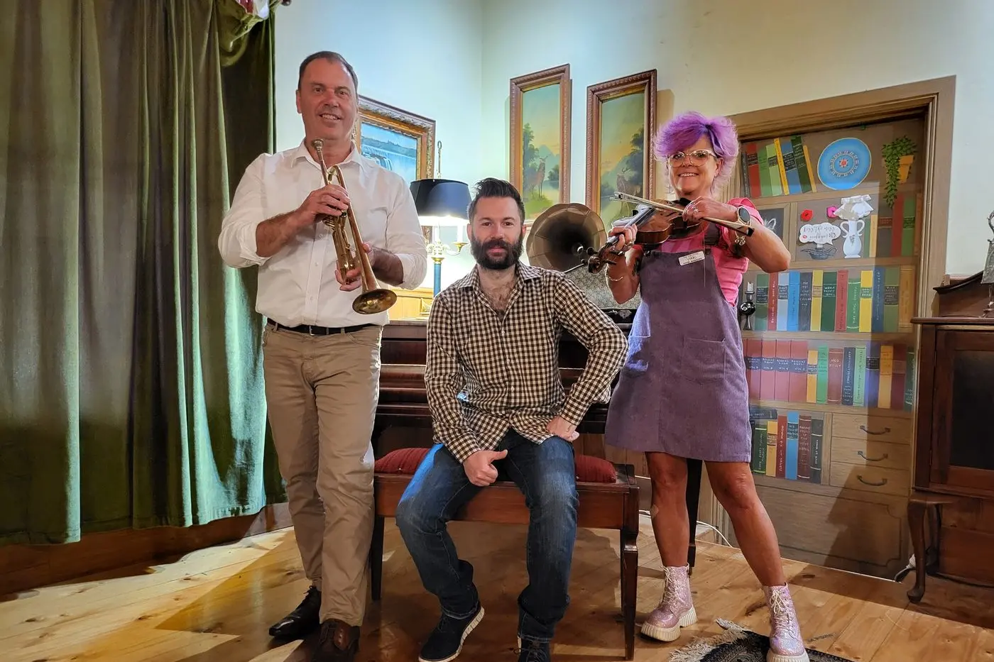 LIVE GIGS BOOST: Minister for Creative Industries Colin Brooks (left) visited Jimmy Ladgrove and Vikki Burns at The Vine Hotel to hear how artists are being supported by funding to put on local live gigs. PHOTO: Steve Kelly