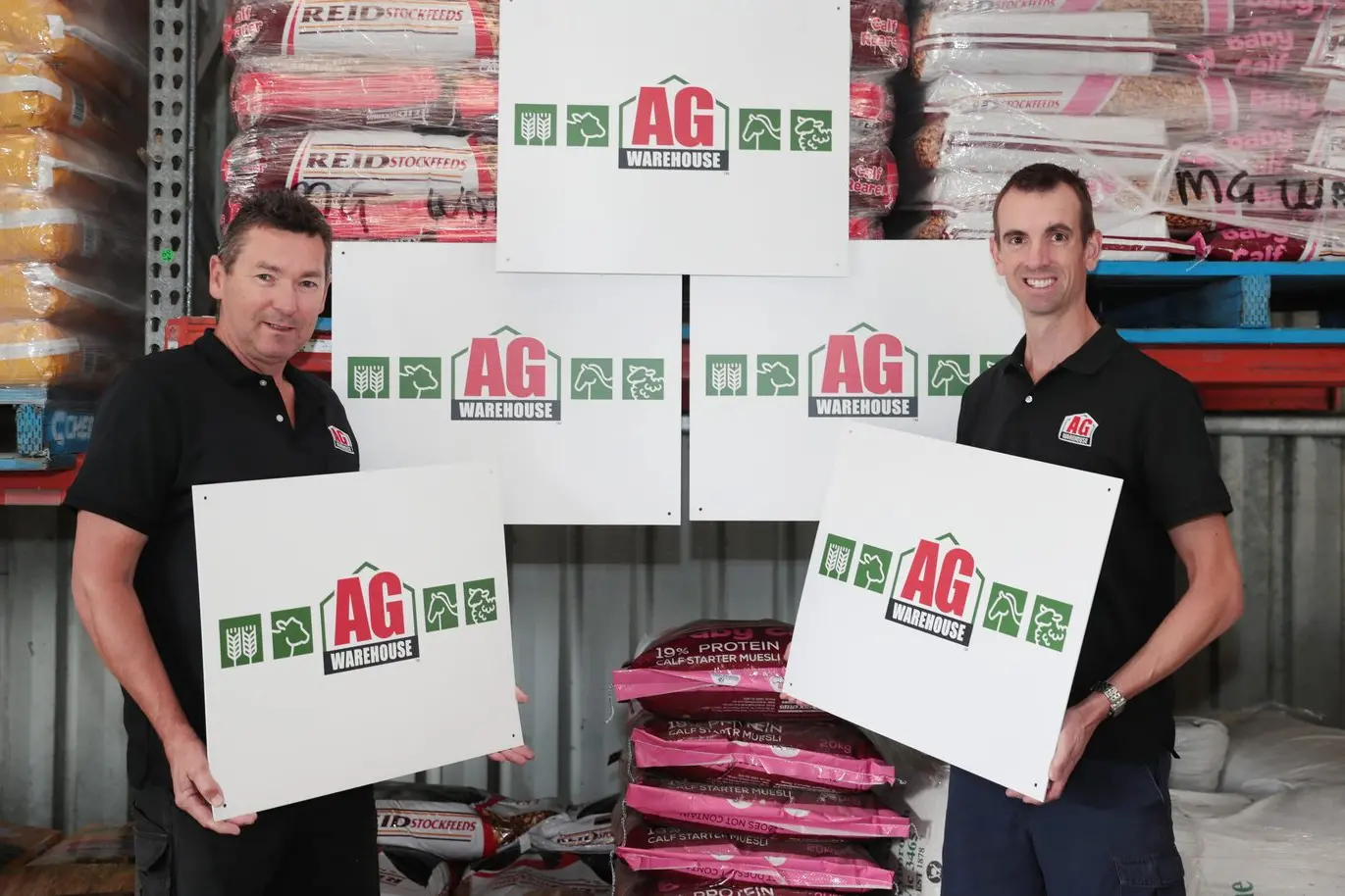 SIGN OF GROWTH: AG Warehouse Wangaratta (formerly Murray Goulburn Trading) store manager James Olphert and assistant manager Luke Norman with the new signage. PHOTO: Kieren Tilly