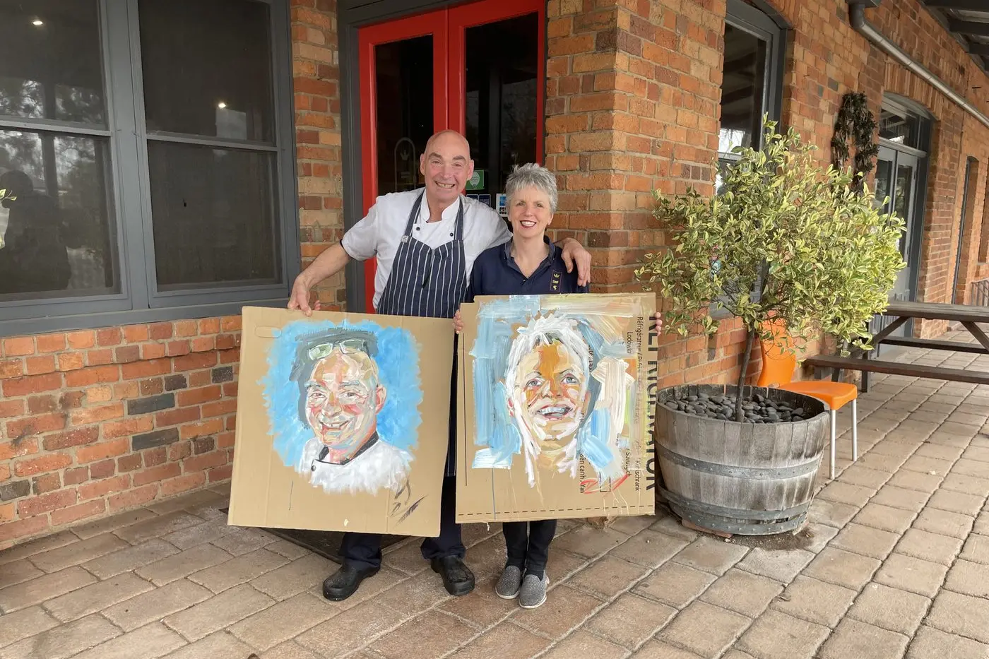 ARTISTIC TASTES: Ben and Judy Bonwick, your hosts at King River cafe Oxley also help promote art at the business.