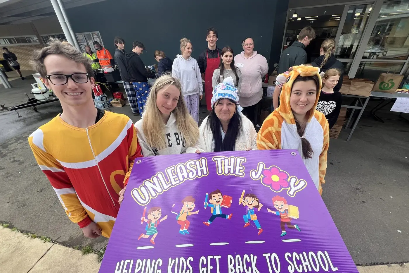 KIDS HELPING KIDS: Wangaratta High School students (from left) Cameron Sgarioto, Ivy O\\'Connor, Unleash the Joy charity founder Donna Vickers and student Alicia Snowdon were rapt with the support at the fundraiser. PHOTO: Jeff Zeuschner