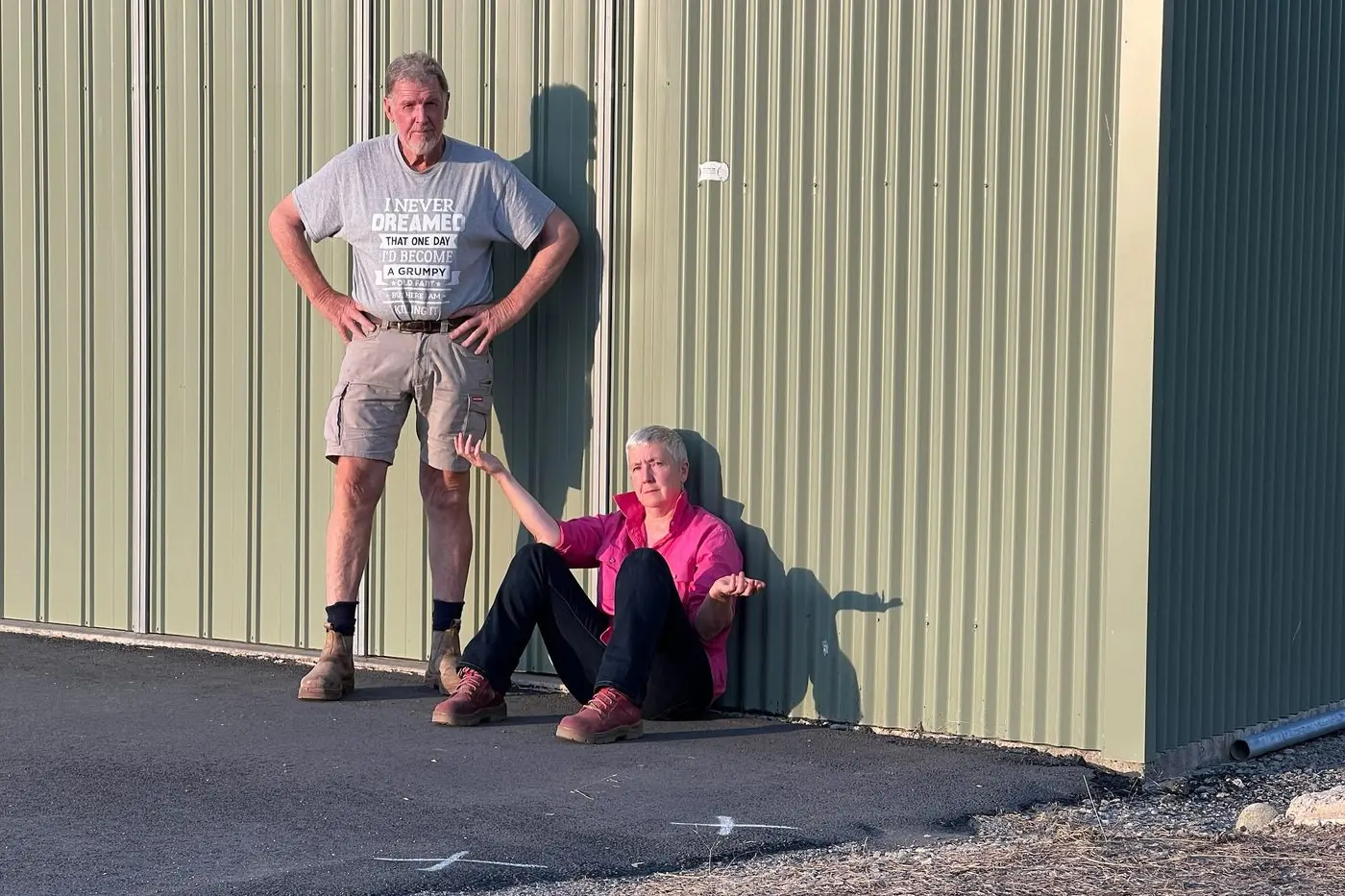 UNHAPPY: Mount Beauty resident Glenn Wilson and partner Kelly Bick are unhappy with Alpine Shire Council\\'s response to on ongoing dispute over flooding at their hangar at Mt Beauty Airport. 