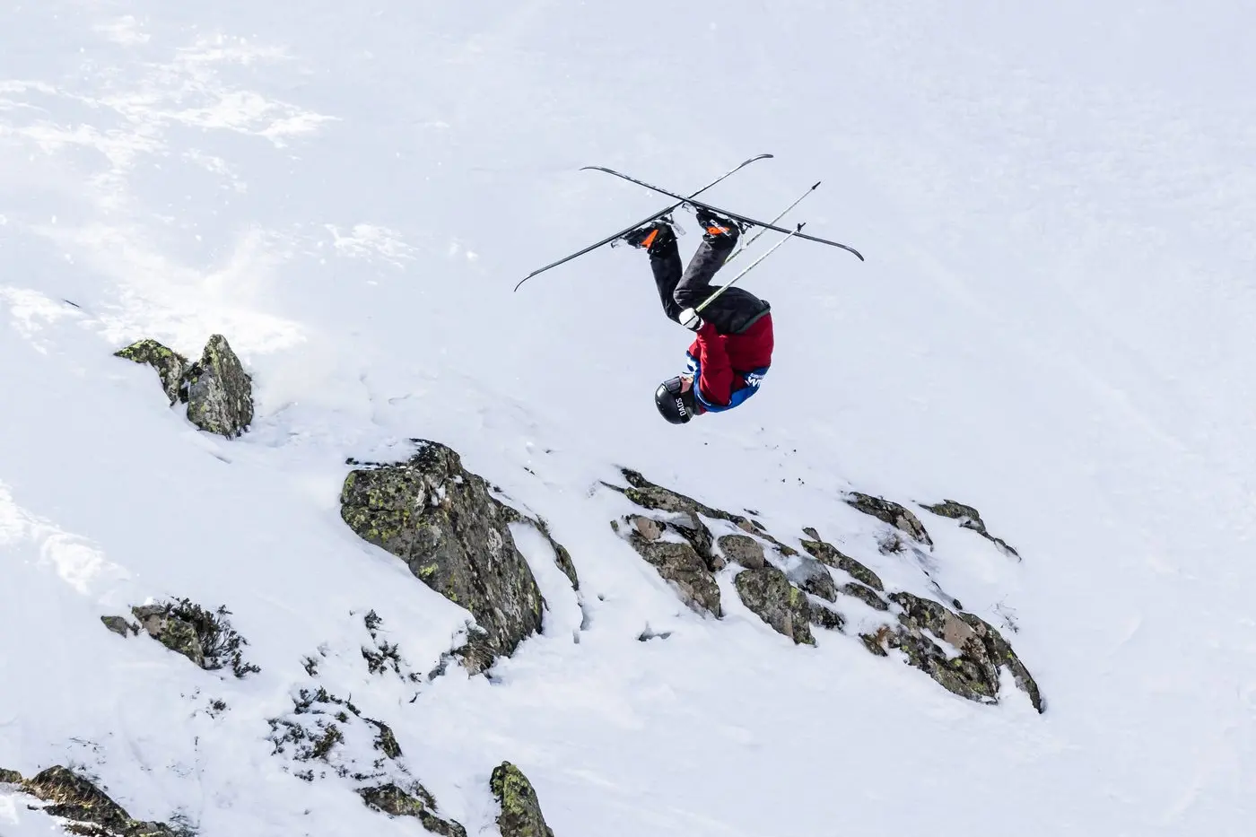 NOW THAT IS TRICKY: There was plenty of big air, tricks and speed at Mt Hotham as skiers and snowboarders competed at Mt Hotham on the weekend in Australia\\'s first ever Freeride World Tour qualifier. Some 200 competitors entertained a large crowd, with this skier showing off his backwards somersault down the steep face of the \\'Peach Bowl\\'. PHOTO: Vail Resorts
