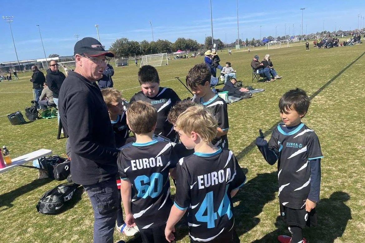 LEADING THE CHARGE: Coach David rallies the team.