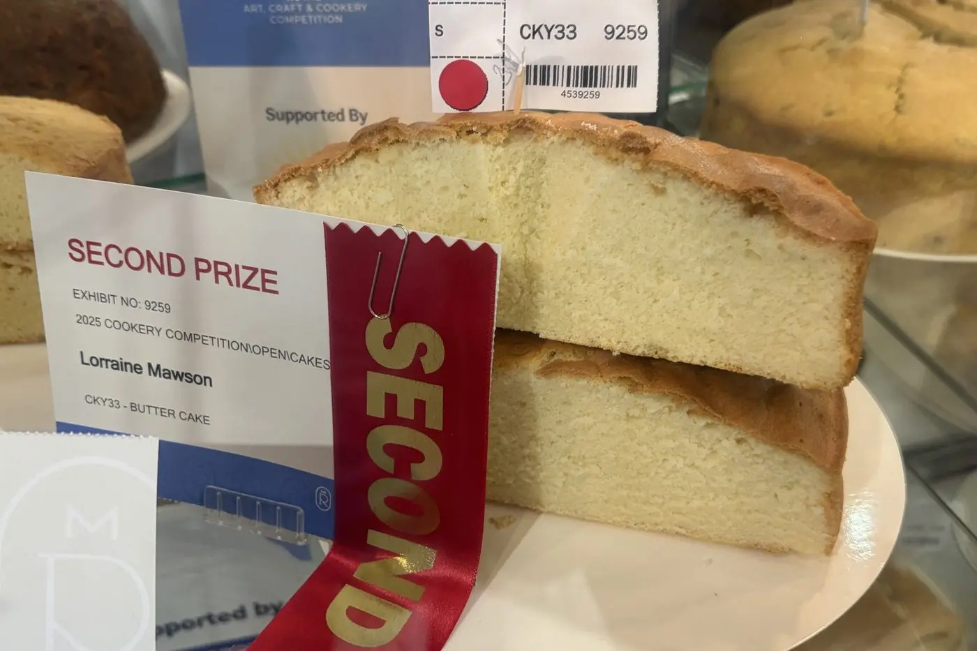 BUTTERING UP: Perennial baking maestro and regular winner Lorraine Mawson with her prize winning butter cake.