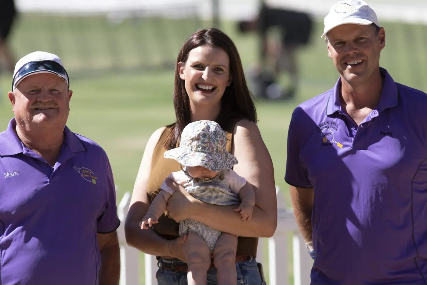OPENING OF THE 95th EUROA TENNIS TOURNAMENT: Mark Borthwick, Annabelle Cleeland with baby Sigrid, and the vice president mark the start of the event.