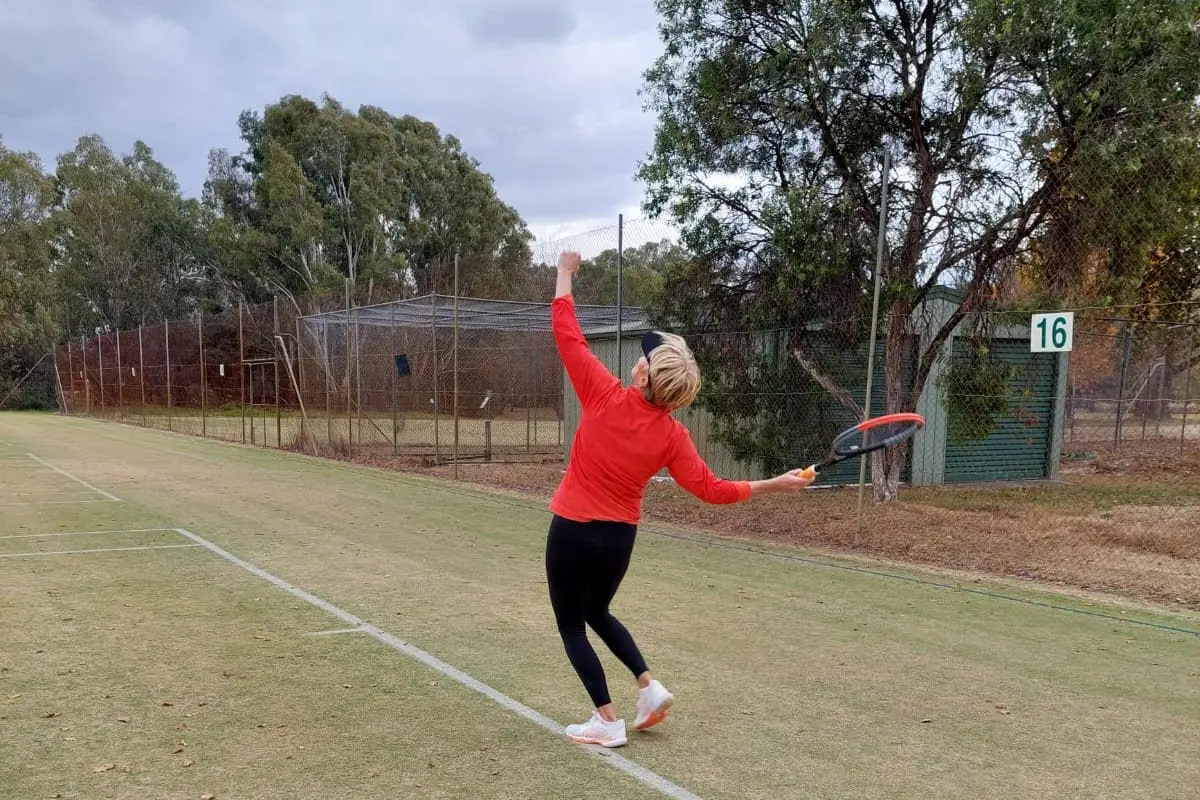 SERVING IT UP: Benalla\\u2019s Kate Campbell prepares to place her serve in the court.