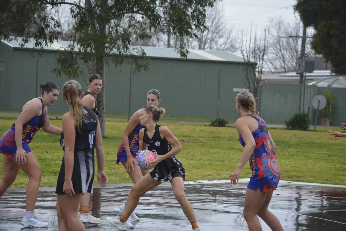 IN AND UNDER: Sarah Ternes looks to get through the Lions defence. PHOTOS: Andy Wilson