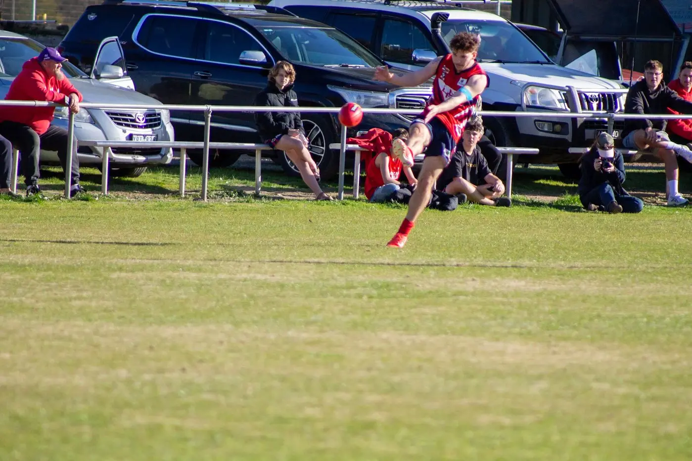 ATTACKING PLAY: Rhys Cason sends the ball into attack. PHOTOS: Cassie Murray