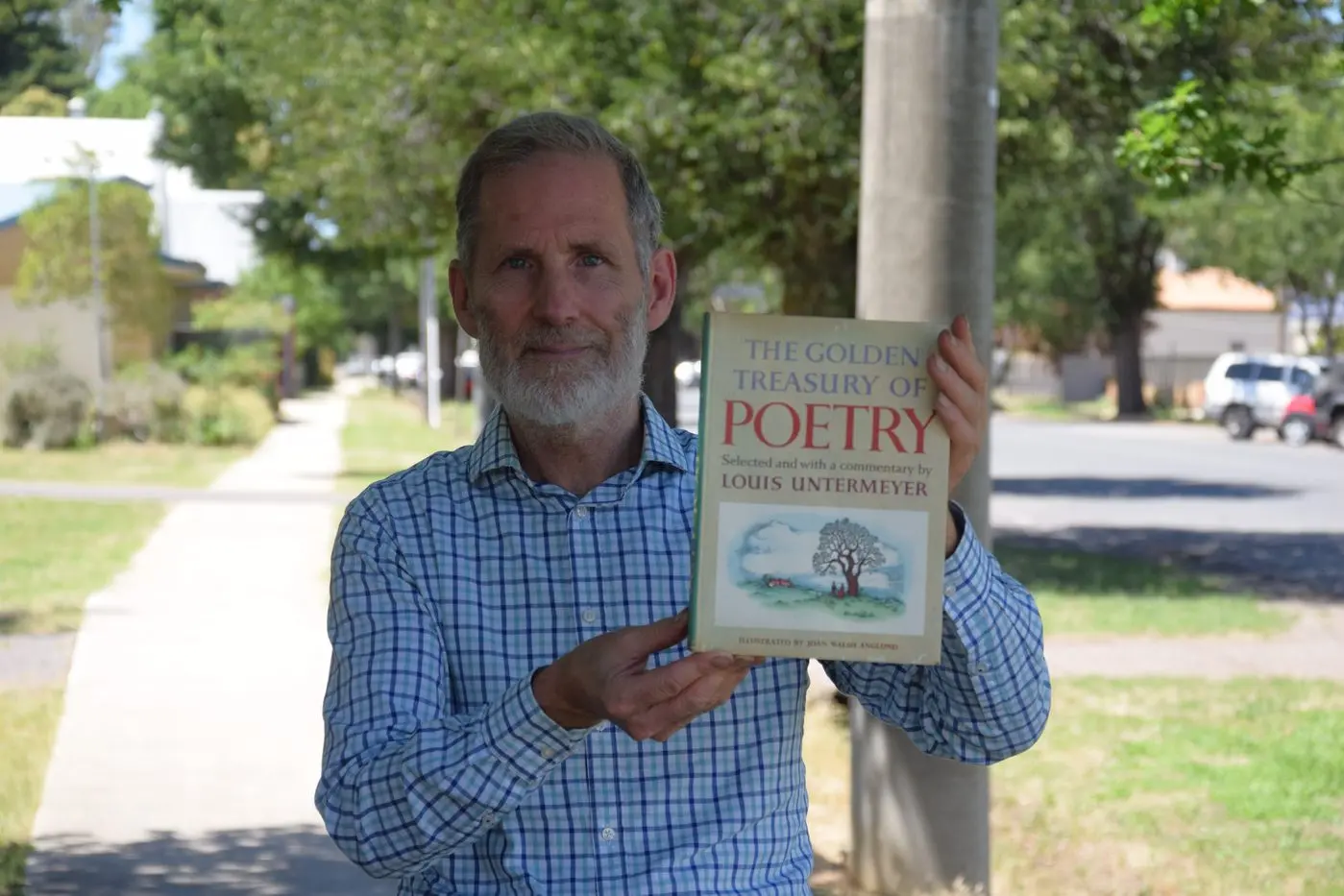 PENNY THE POET: Craig Penny with one of his favourite poetry books, which he received for his eighth birthday. PHOTO: Darren Chaitman