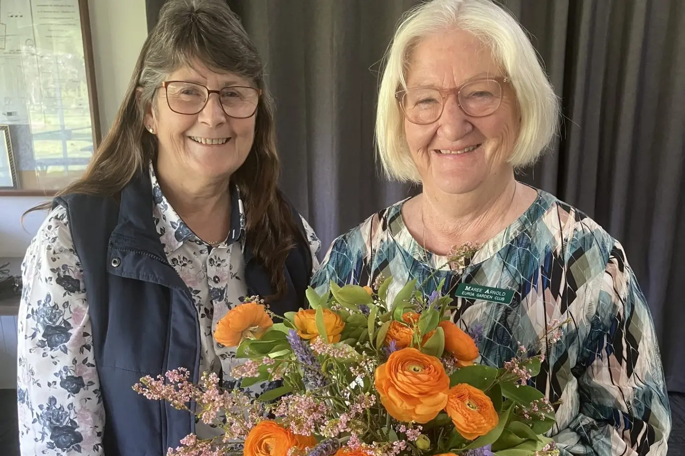 DARLING BUDS OF OCTOBER: Guest flower arranger Pam Case with club member Maree Arnold and an eclectic mix of Ranunculus and Lavandula among some even more mismatched flora.
