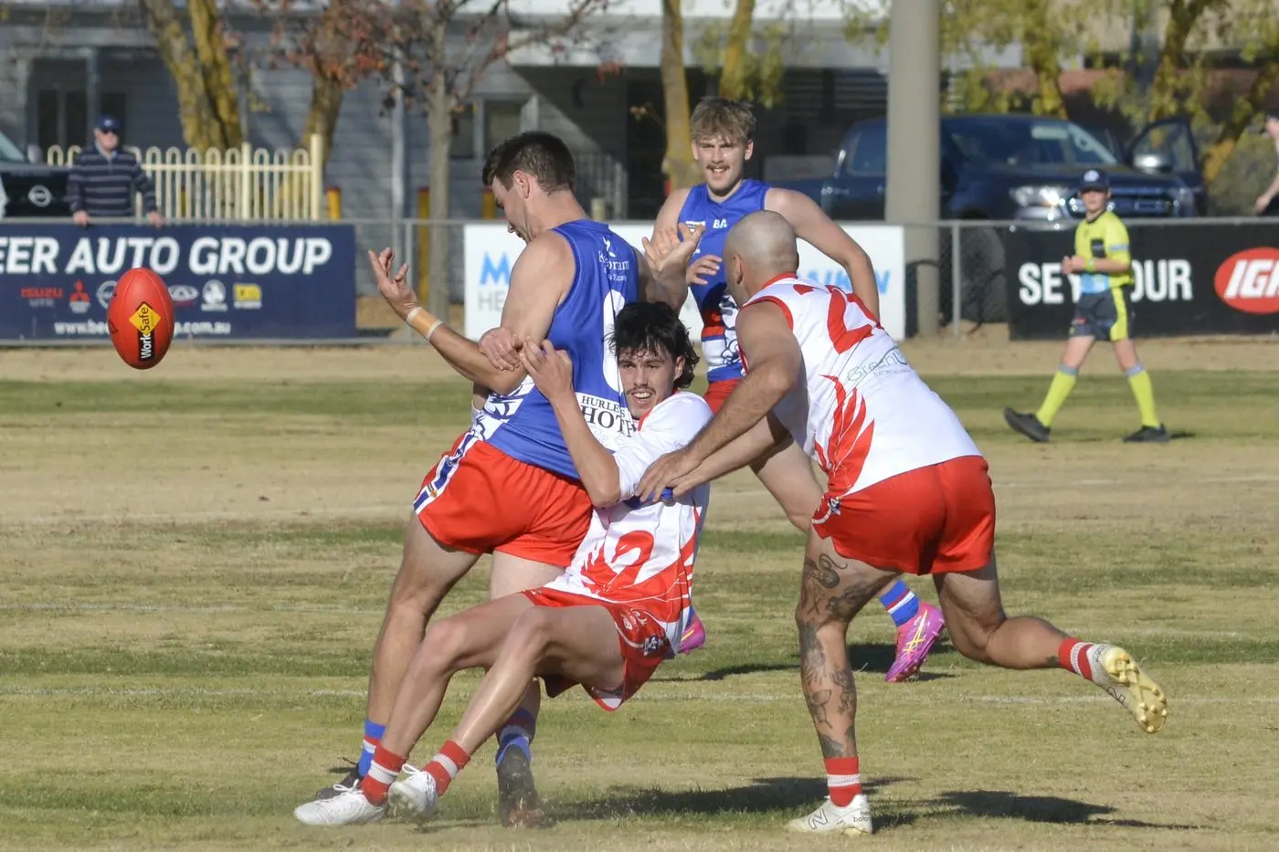 STRONG TACKLE: Avenel\\'s Alex Crnko drags down Merrigum\\'s Tom Cooper in a fierce early contest before going on to boot nine goals, taking his season tally to 26. PHOTO: Andy Wilson