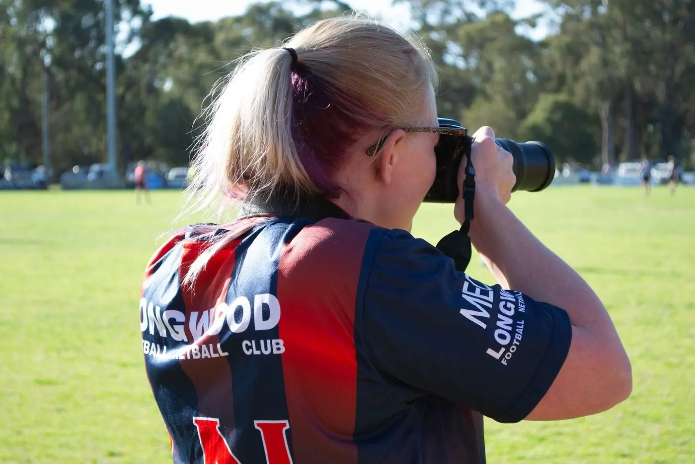 NOT FOR THE LIMELIGHT: Cassie Murray eschews the camera herself but certainly enjoys the chase on-field.