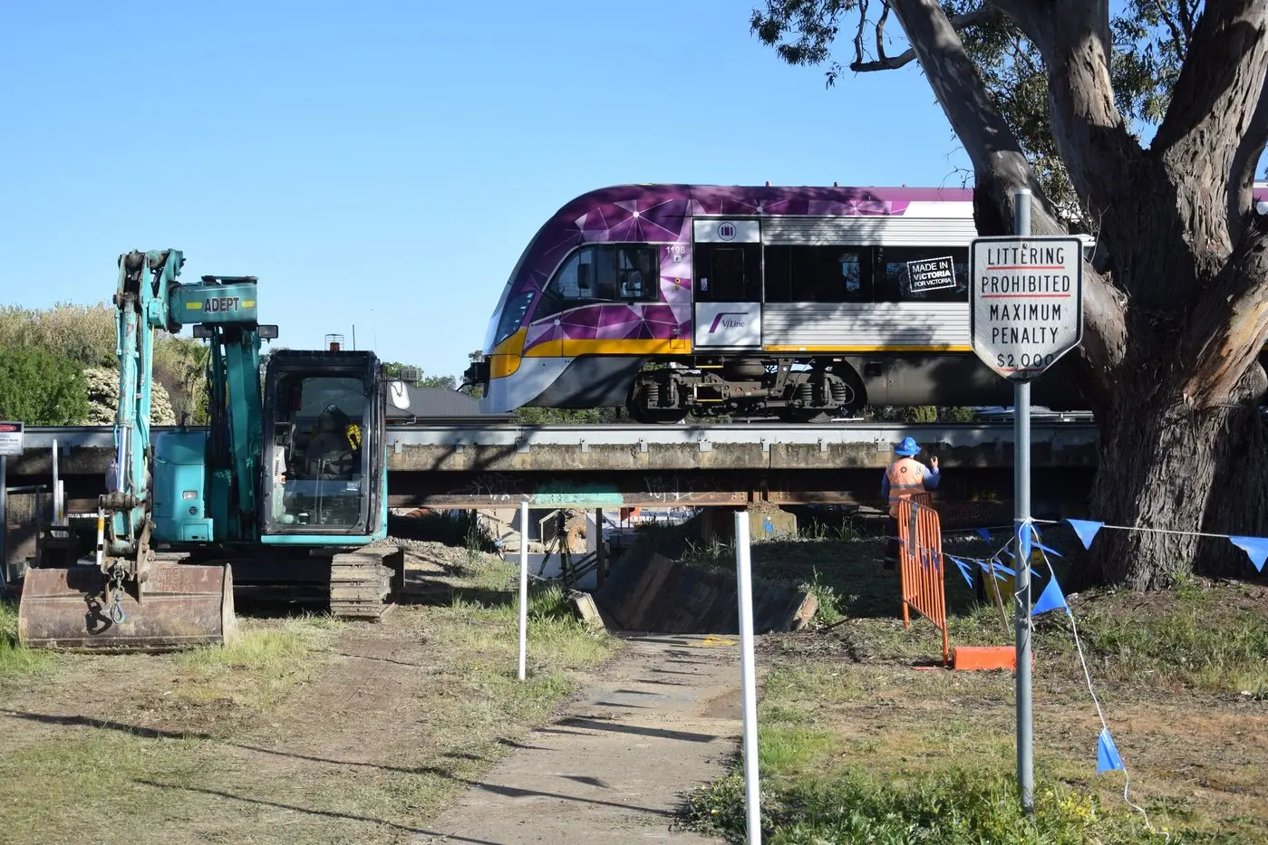 CLOSED FOR NOW: Inland Rail surveyors and engineers down tools to let Friday\\'s 8:20 to Southern Cross pass over Frost Street underpass. PHOTO: Andy Wilson