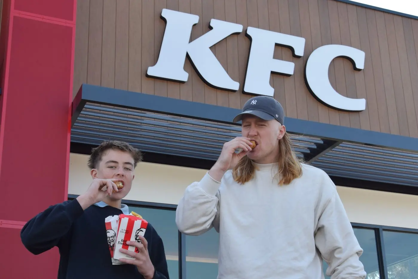 EARLY BIRD: Ollie Wilson (left, 14) and Fletcher Paul (20) were Euroa KFC\\'s first ever diners on Monday morning. PHOTOS: Darren Chaitman