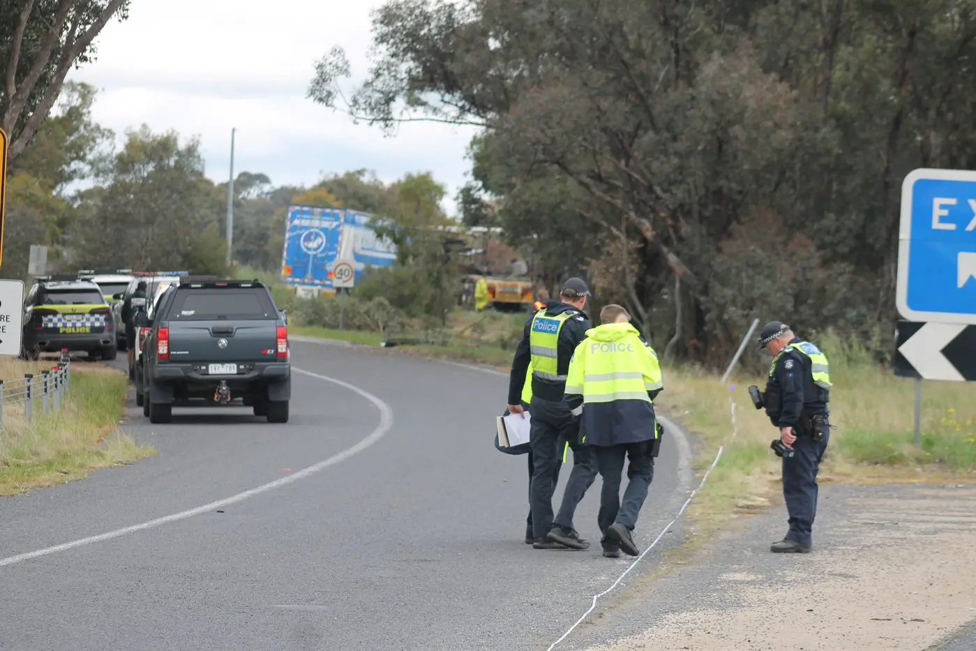 TRAGIC SCENES: A truck smashed into two parked truck inside this rest area near Wangaratta on the Hume Freeway on Wednesday morning. PHOTOS: Bailey Zimmermann