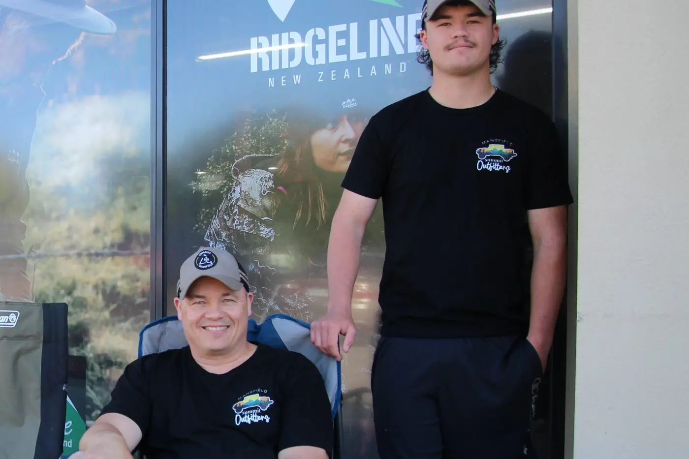 FAMILY AFFAIR: Rob Deeble and son Ben outside their outdoor supplies store rely on the the income that hunters and campers bring to the region. PHOTO: Lynn Elder
