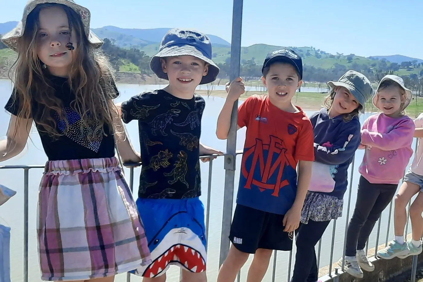 FUN IN THE SUN: Tawny Drysdale, Billy Universita, Noah Mahoney, Eva McAllister and Ebony Hamstead on the Bonnie Doon bridge as part of their school holiday program at The Farmhouse.