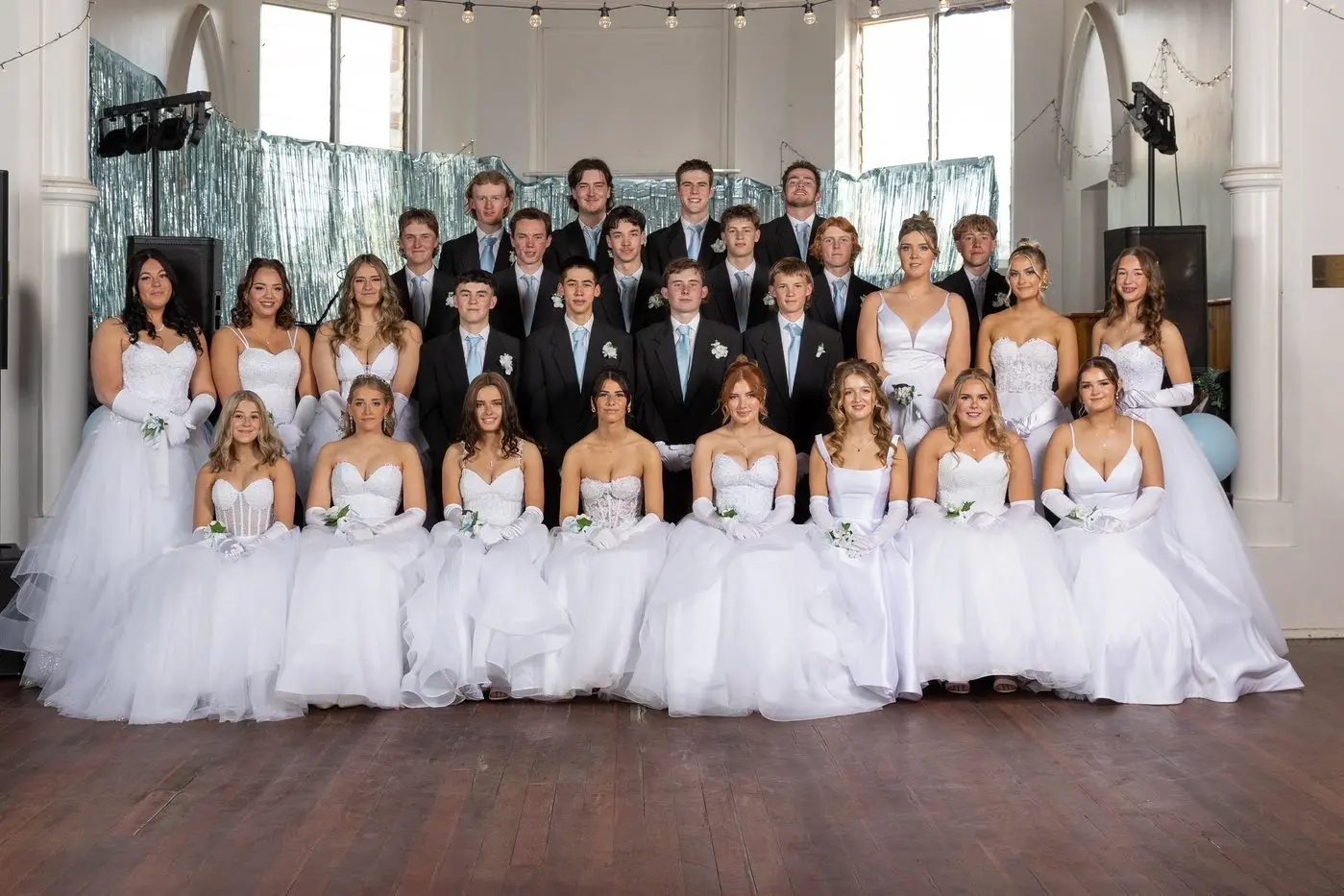 ALL DRESSED-UP: Due to the large number of debutantes in recent years the ball has been held over two nights, with the Saturday night group pictured above.