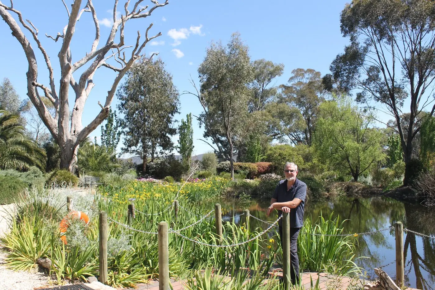 GARDEN OASIS: Les Bolitho welcomes visitors to come and visit Sable Park this weekend and explore the garden, which includes a stunning water feature, while also supporting Carevan Wangaratta. PHOTO: Agnes Menanopo