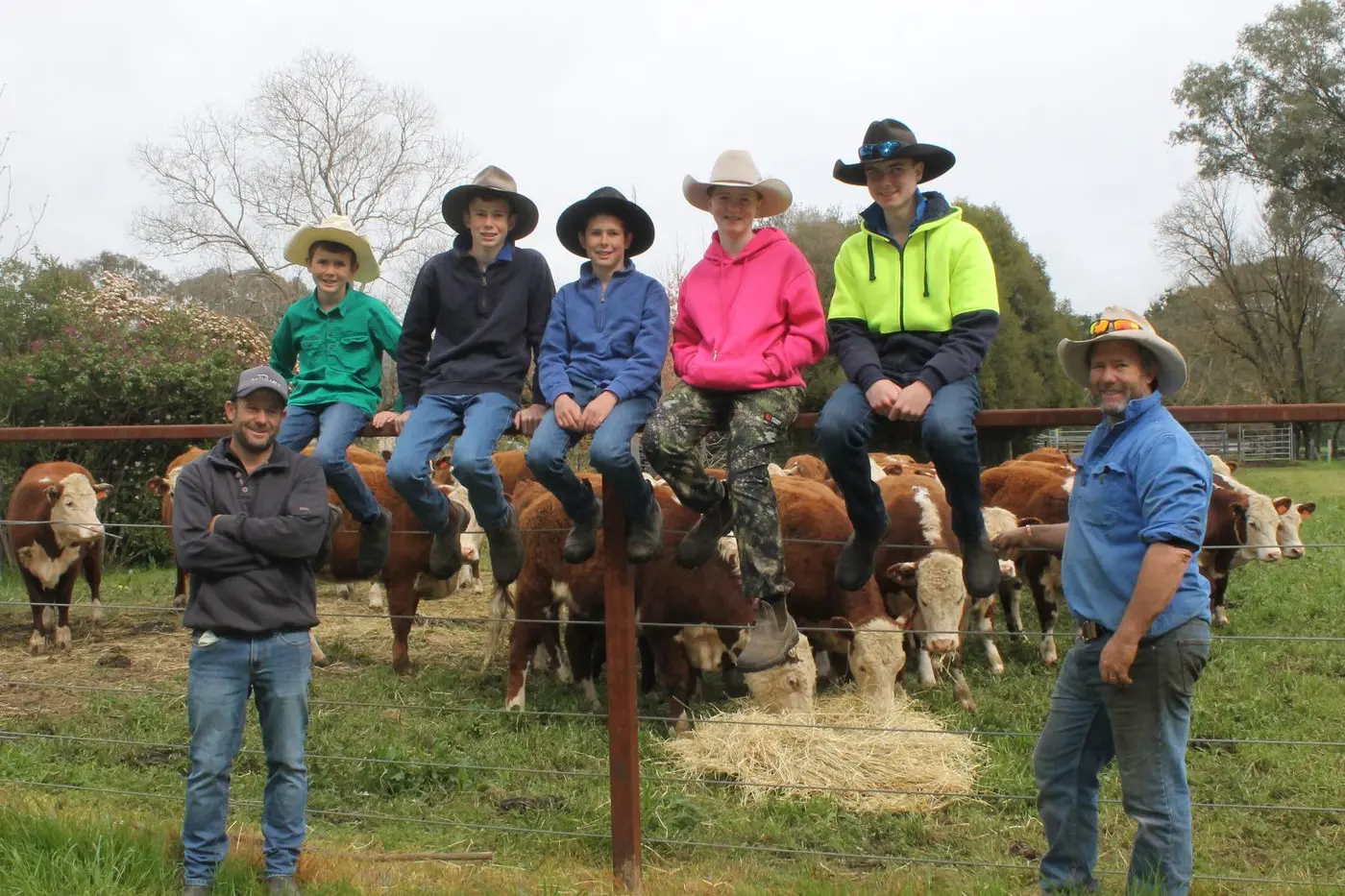 FAMILY AFFAIR: Brothers Luke (left) and Dan (right) Matheson and their children (from left) Hudson, Harry, Charlie, Chelsea and Jack, are hoping their cattle fetch a decent price at market in Myrtleford this Friday. PHOTO: Phoebe Morgan