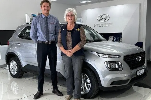 GREAT PRIZE: Tyson Beamish from Hyundai at Wangaratta Motor Group with Bev Maher from Rotary Club of Appin Park Wangaratta alongside the Hyundai Venue, which is first prize in the community raffle.