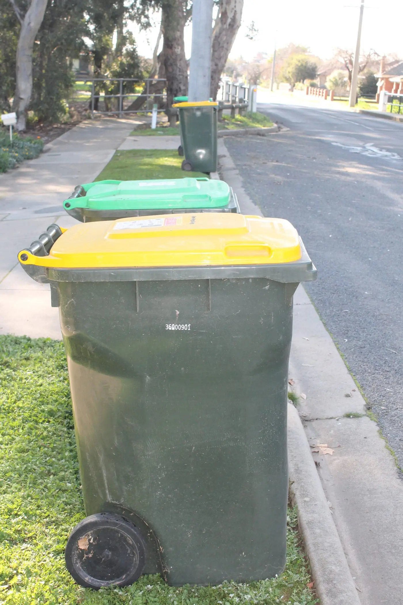 RECYCLE: Council currently maintains the use of yellow-top recycling bins in public areas, with no changes planned to this service. 