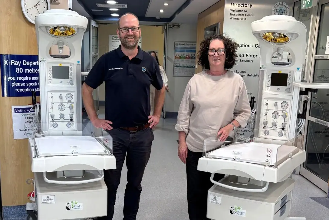 NEW ARRIVALS: Northeast Health Wangaratta executive director of people and corporate operations Kim Bennetts, and manager of biomedical engineering Nathan Carter with the two new neonatal resuscitation cots.
