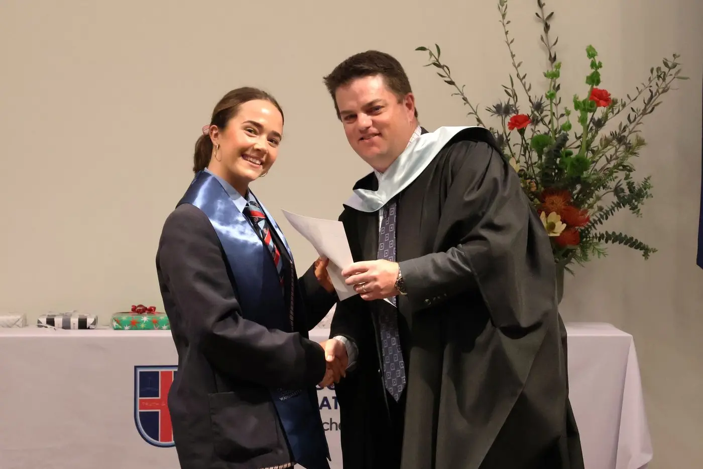 THE GRADUATE: Takara Bongiorno, who has attended CCW since prep, receives her graduation certificate from principal Nick Jones.\\n