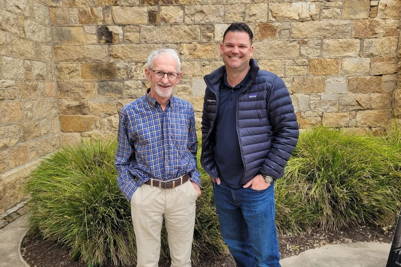 INFORMATIVE: Totally Renewable Beechworth management committee member Peter Anfruns (left) looks forward to Indigo Power project manager Heath Shakespeare delivering the latest info about community batteries next Saturday. PHOTO: Coral Cooksley