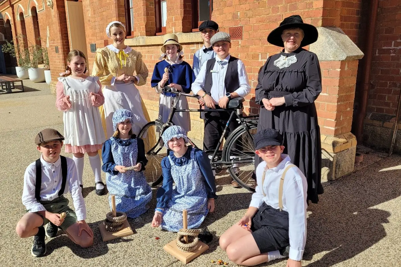 BACK IN THE OLD SCHOOL DAYS: Beechworth Primary School students Lily Barlow (back left), teacher Bethany James, students Naomi Burgess, Cade Stone, Miles Brokensha and principal Susan McDonald with (front left), Prosper Tomlinson Indianna Bockman, Billie Howlett and Clancy Kelly, at the step back in time event to celebrate the school\\u2019s 150th anniversary. PHOTOS: Coral Cooksley