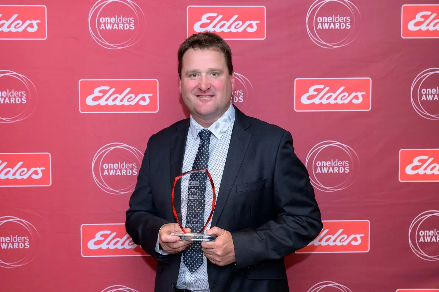 ACKNOWLEDGEMENT: Craig Sharam, Elders Bendigo branch manager, receives One Elders\\' \\'Give It\\' community action award.