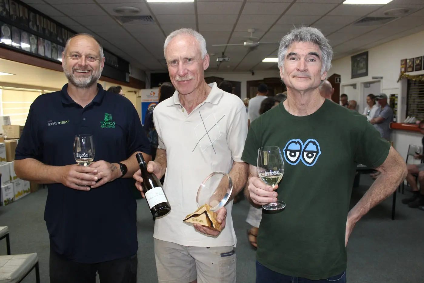 BOTTLED BOUNTY: Enjoying the wine show were (from left) TAFCO representative Rupert Shaw, multi-award winemaker Mark Walpole, and NVWC chief Judge Steve Flamsteed.