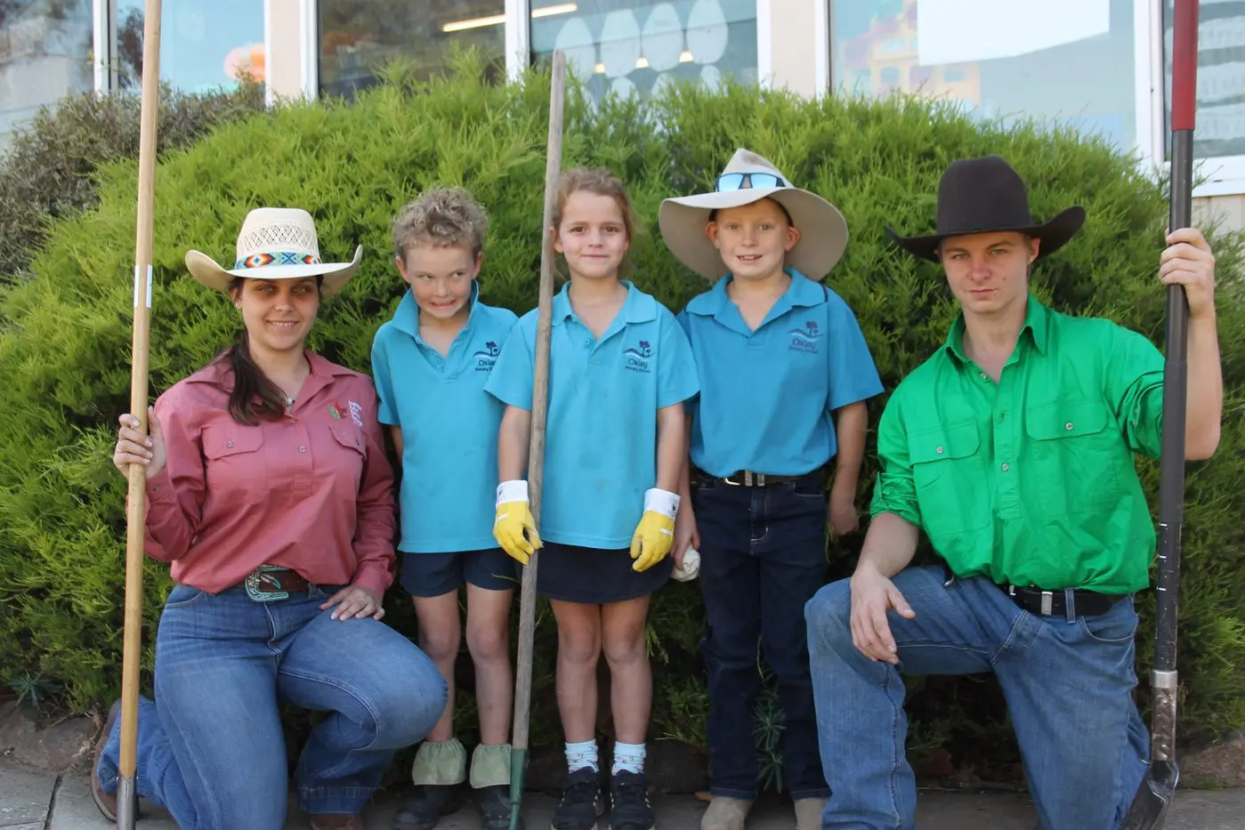 FUTURE FARMERS: Program participants Brooklyn Friels (left) and Jethro Novak (right) with Oxley Primary School students William Perkins, Aurdey Hester and William Leochel were excited to work together in the garden. PHOTO: Jordan Duursma
