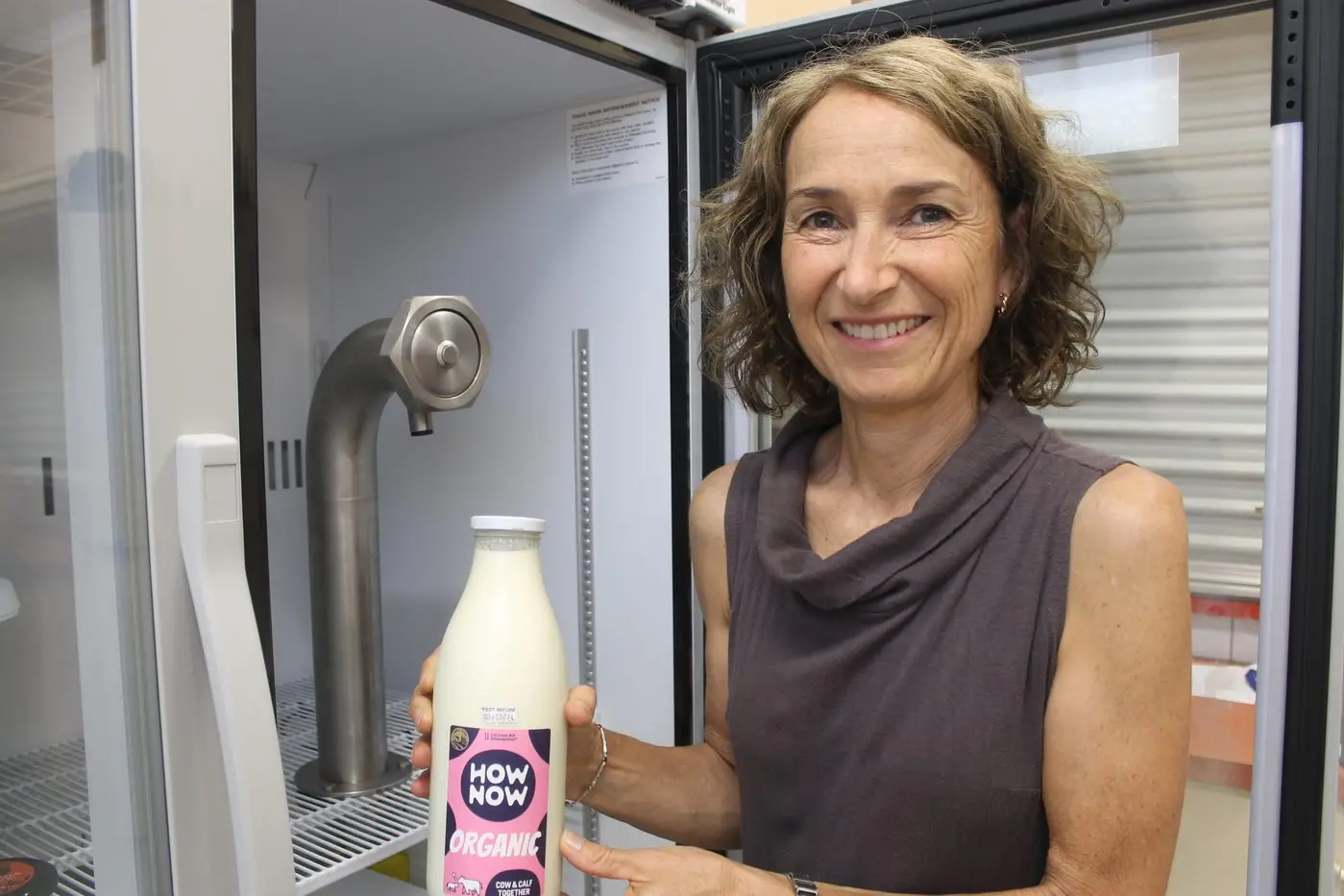 FRESH MILK: Bright Food Co-op treasurer Gil Paulsen with the newest addition from producers.