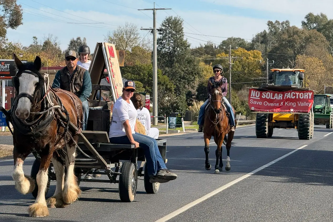 ONWARDS: Richie Callaway and his Clydesdale Sheena led a convoy through Oxley down to Bobinawarrah on Thursday.