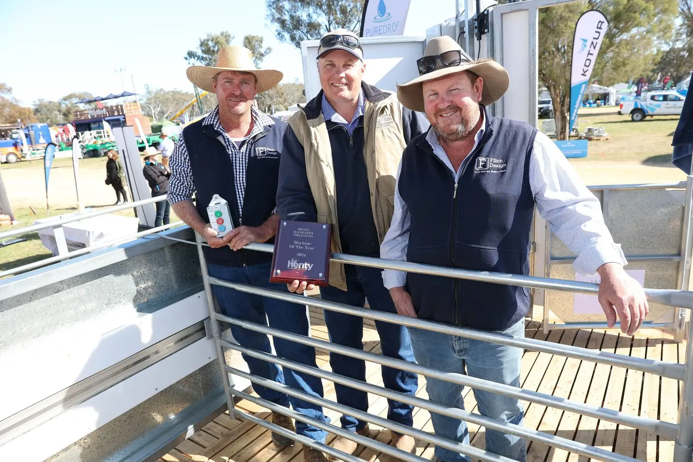 RAM-TO-EWE: Bob Thornely, Henty Machine of the Year judge Warren Scheetz, and Simon Flinn, Flinn Design, winner of the Henty Machine of the Year Award. PHOTO: Andy Rogers \\n