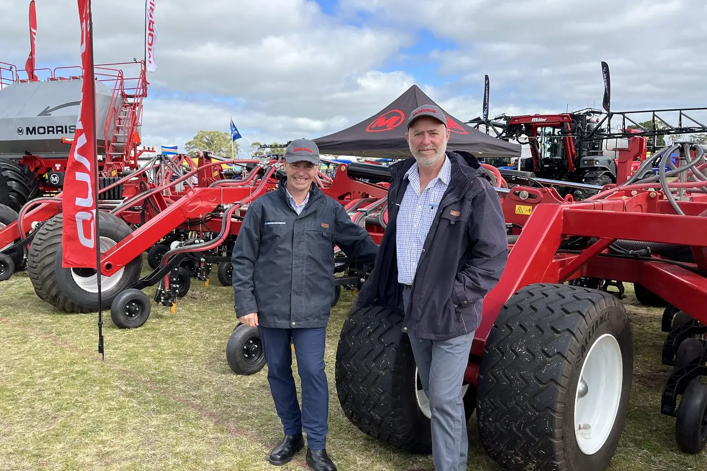 GUYS IN THE KNOW: Duncan Murdoch and Eliot Jones, from national Morris distributor, McIntosh Distribution, with the new, larger 24-metre Morris Quantum air drill during the recent round of farm machinery field days. Duncan says Quantum air drill owners are increasingly recognising the machines \\u201Chelp them grow better crops\\u201D and he expects the 24m model to lead sales from the range soon.