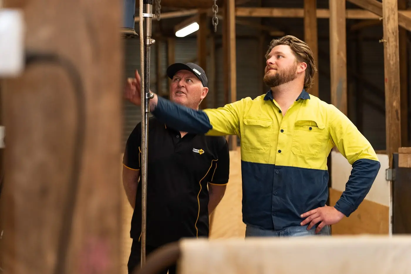 BE SAFE: Sheep and cropping farmer Jack Armstrong with WorkSafe Inspector Dallas Braam on his  Yalla-Y-Poora property in the shearing shed.