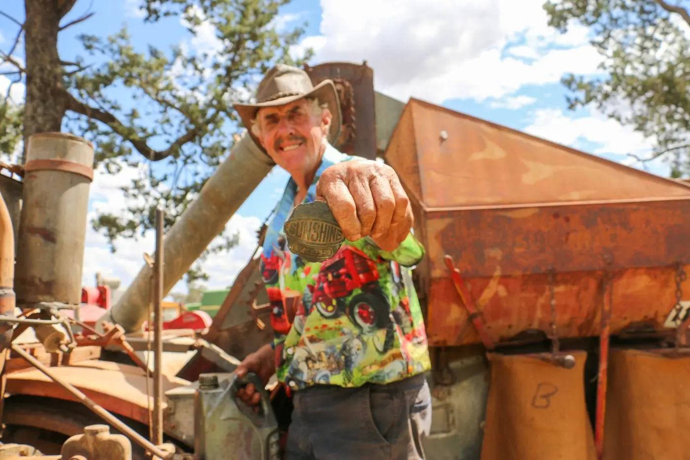COLLECTOR: Kerry Pietsch with a Sunshine fuels up his historic Sunshine Auto header originally owned by his father Victor Piestch.