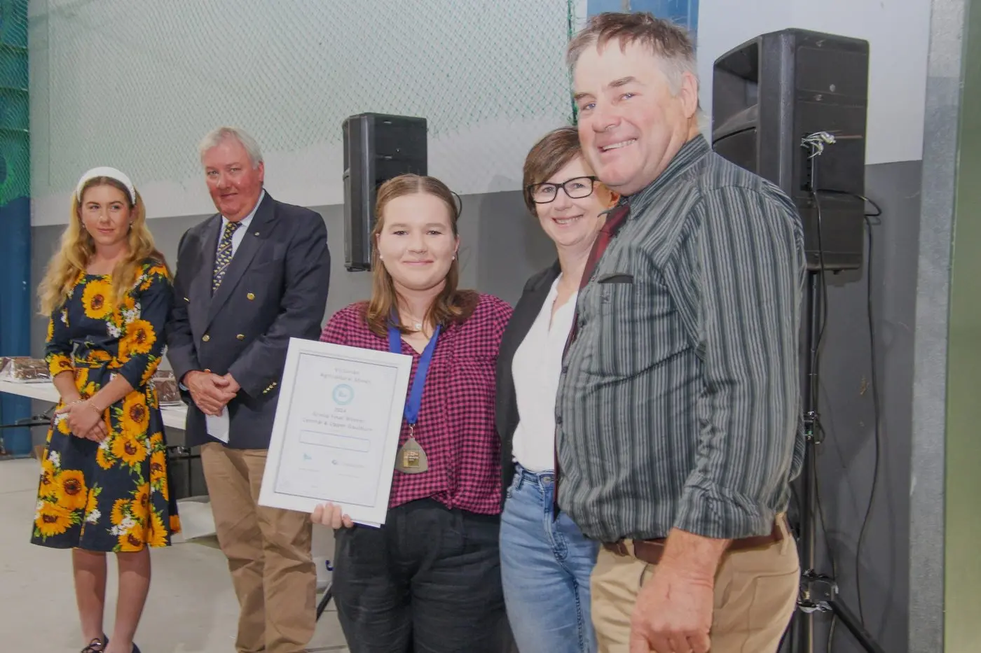 JUNIOR AMBASSADORS: Central & Upper Goulburn Group state finalist is Yea\\'s Claire Noonan (centre). Runner up was Mansfield\\'s Jess Andrews (left) with group president Jason Ronald and judges Lynn and Rob McCarthy. PHOTO: Lynn Elder