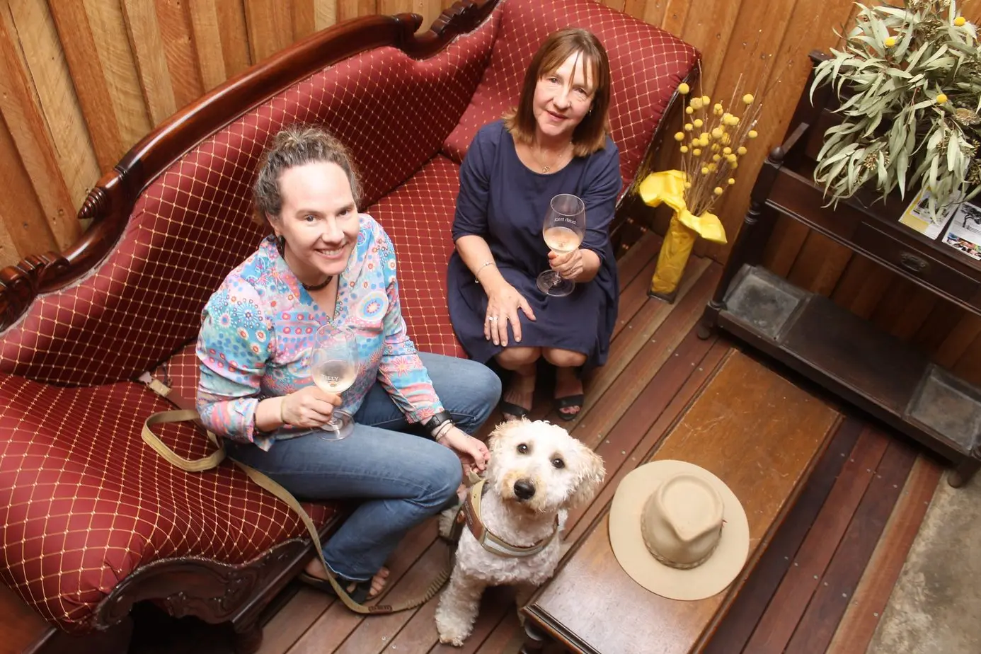 FAMILY REUNION CELEBRATES COMING TOGETHER OF WINE GROWERS: Blaize and Leanne Montgomery celebrate with Bodhi the success of a local sparkling wine at Billy Buttons Wines. PHOTO: Andy Wilson Id:34644